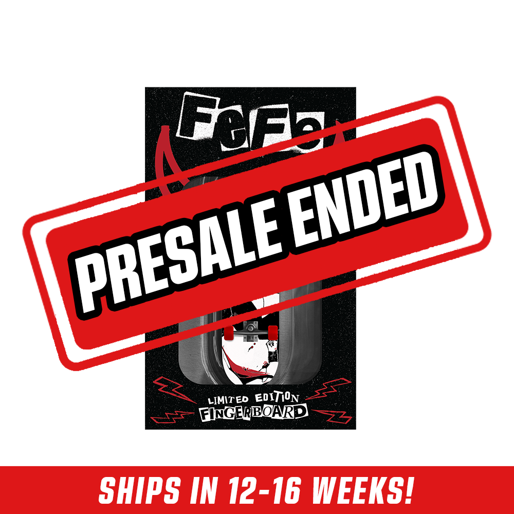 Black fingerboard with red wheels featuring an anime-style character in black and white with red accents in black packaging.