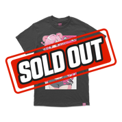 Black shirt with small pink bear face and stylized white and red graphics near the upper back neckline.