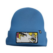 Blue knit beanie with a folded cuff featuring a patch of an anime-style eye and pink Japanese characters.
